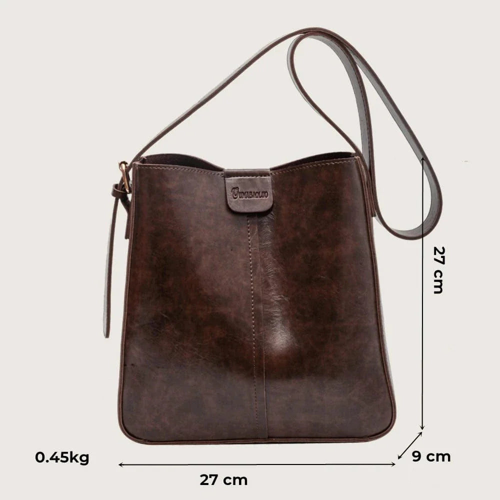 Accessoire de mode: sac à main cabas en cuir vegan marron, spacieux et chic, avec fermeture éclair.