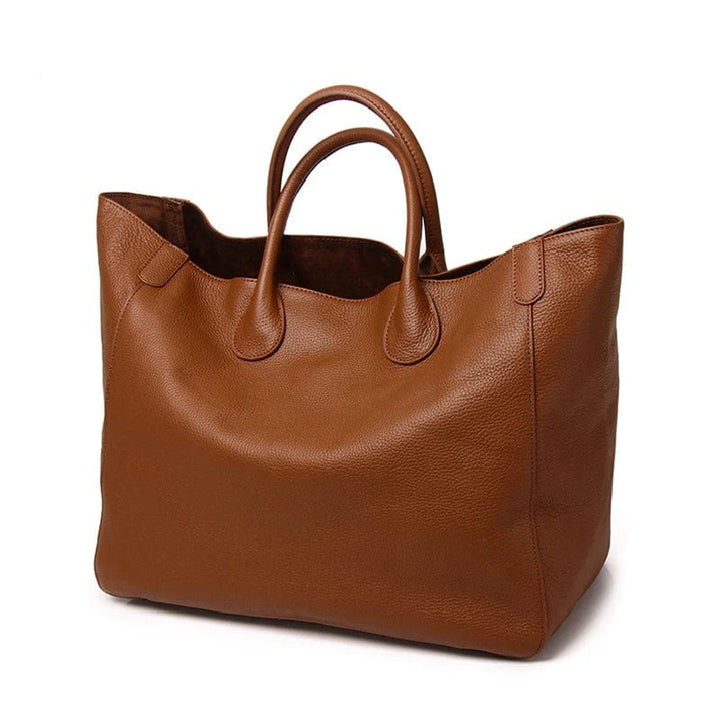 Sac cabas femme élégant en cuir camel, grande capacité, parfait pour ordinateur portable et usage quotidien en ville.