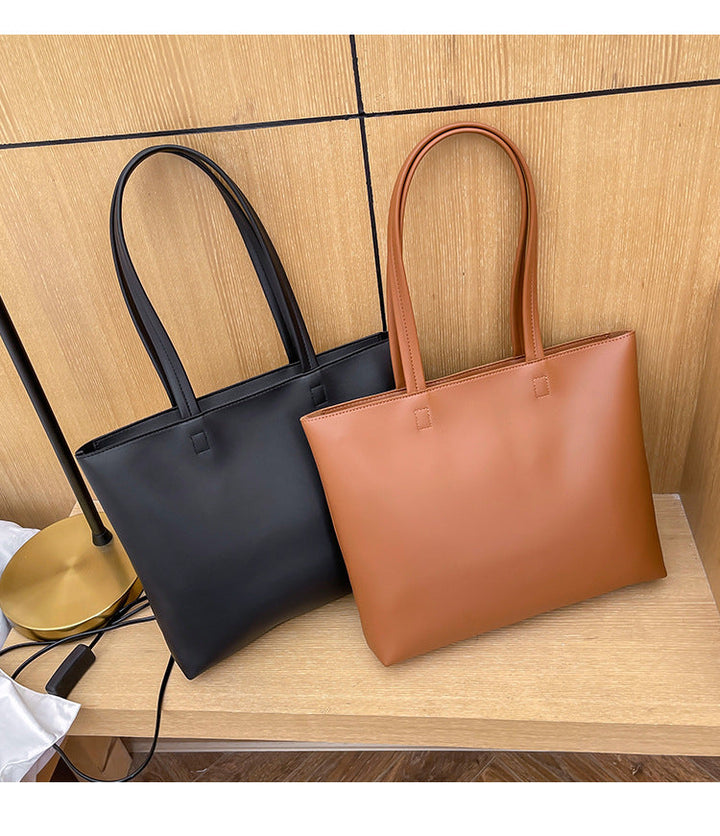 Sac cabas élégant pour femme, en similicuir. Polyvalent pour les cours, le travail ou une sortie en ville.