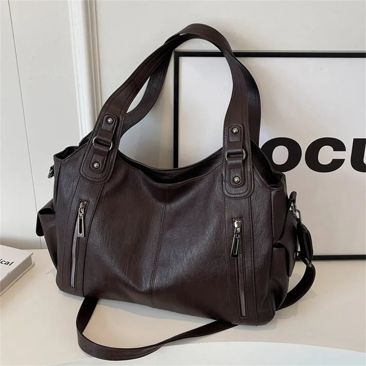 Sac cabas femme élégant en similicuir, parfait pour l'organisation quotidienne et la mode.