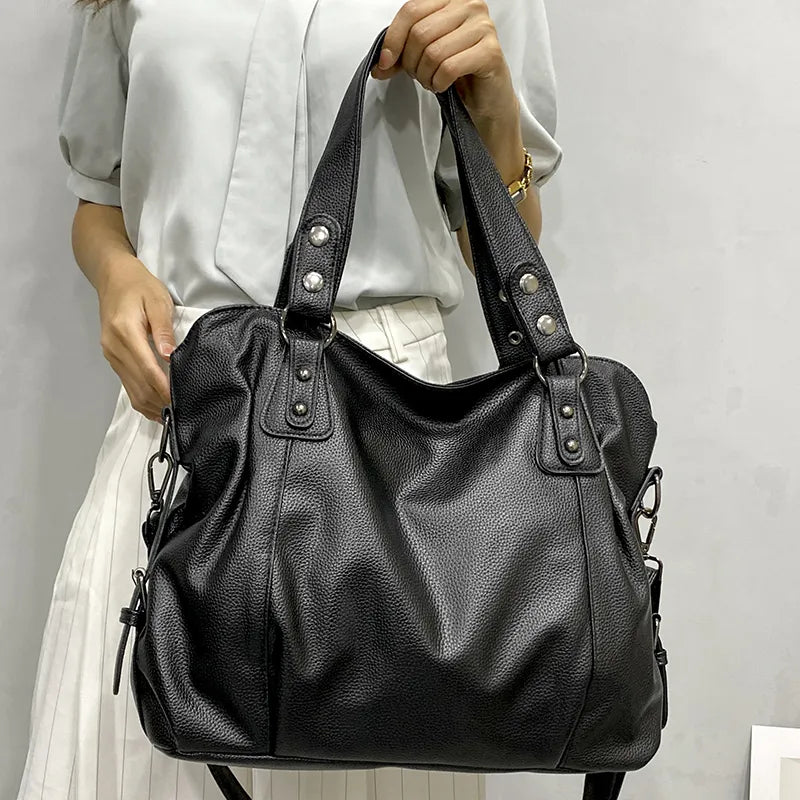 Grand sac cabas femme en similicuir, design moderne et élégant, parfait pour les étudiantes actives.