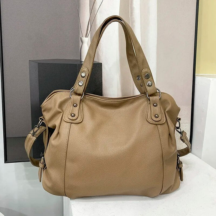 Sac cabas femme spacieux pour étudiante, avec compartiments, idéal pour l'organisation des fournitures de cours.