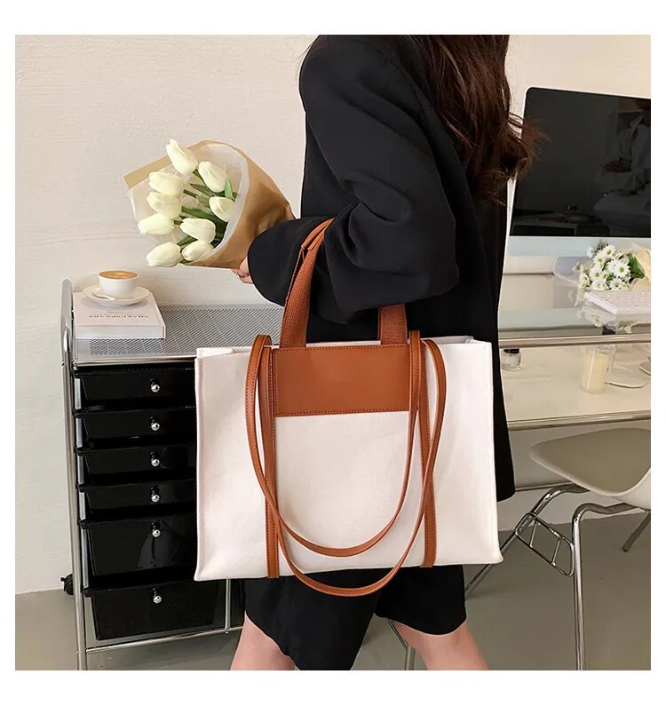 Sac cabas femme élégant en toile et similicuir, grand volume, idéal pour le quotidien, le travail ou les voyages.