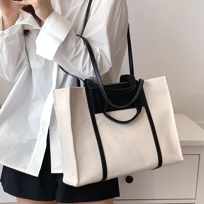 Sac cabas femme élégant et polyvalent en toile et similicuir, un accessoire mode intemporel pour toutes saisons.
