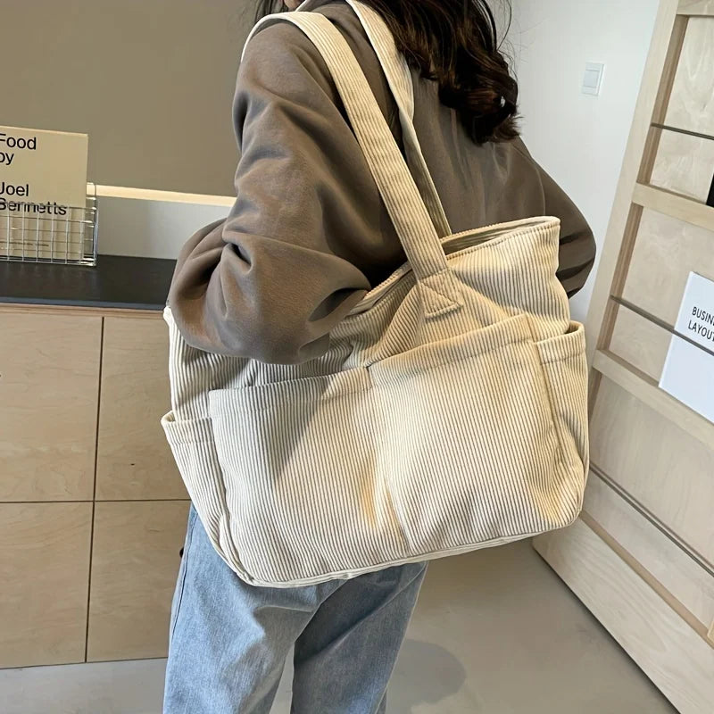 Sac cabas velours côtelé, compagnon idéal pour le voyage, le travail, ou comme sac étudiant.