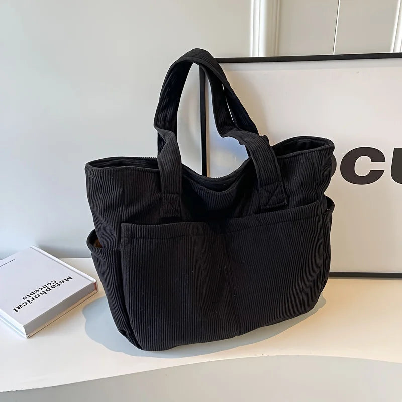 Sac cabas femme en velours côtelé, style décontracté et élégant pour usage quotidien.
