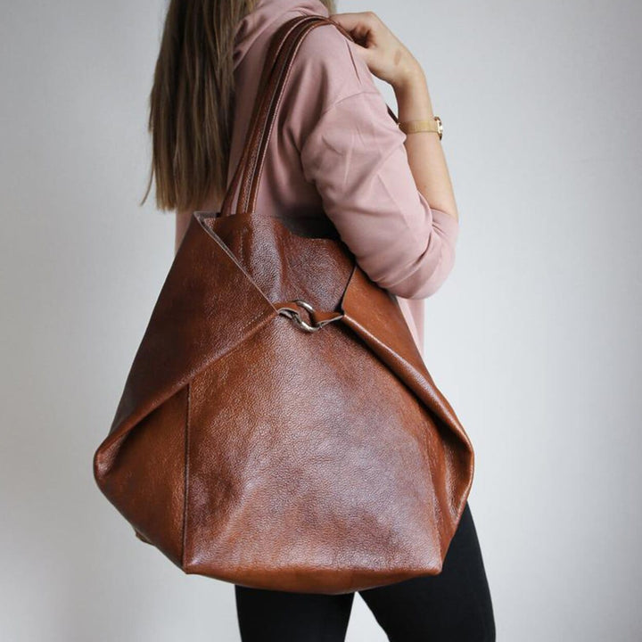 Sac cabas femme noir en cuir PU, élégant et spacieux, parfait pour le quotidien.