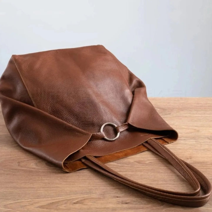 Sac cabas élégant pour femme, en cuir PU noir, avec poches intérieures, polyvalent et pratique.