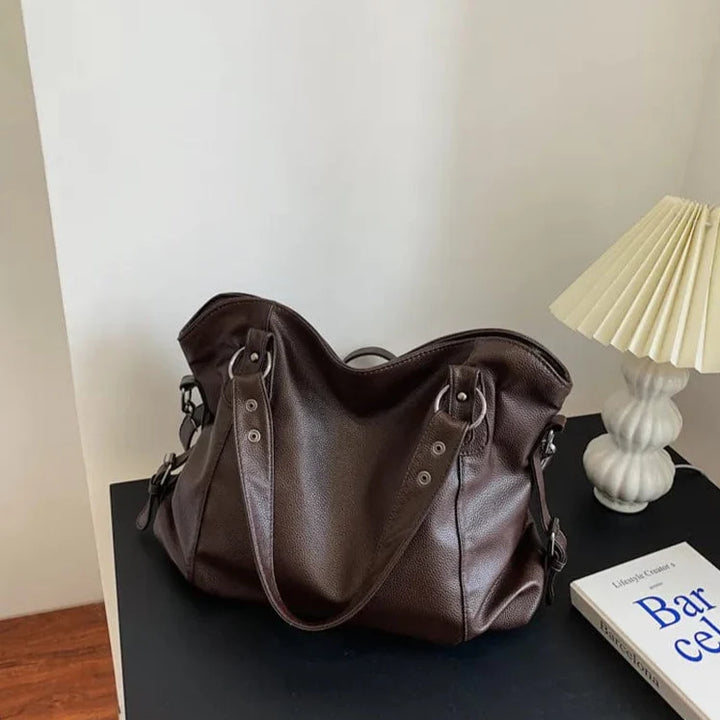 Sac à main beige rosé en cuir PU souple, style cabas, léger et confortable pour un usage prolongé.