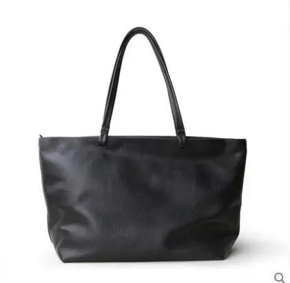 Sac cabas en cuir grainé camel, un accessoire femme élégant et pratique pour la mode au quotidien.