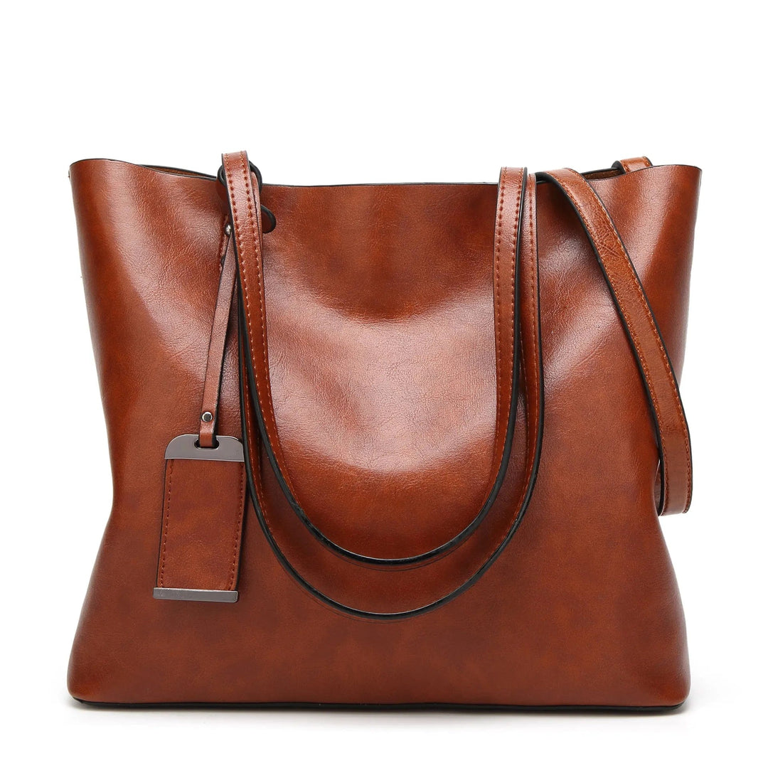 Sac cabas femme bleu marine en cuir synthétique, design élégant, parfait pour le travail ou shopping