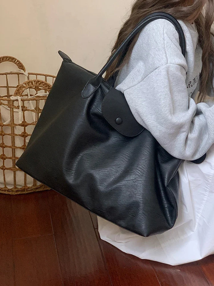 Sac à main cabas élégant en similicuir pour femme, accessoire mode polyvalent pour cours et travail.