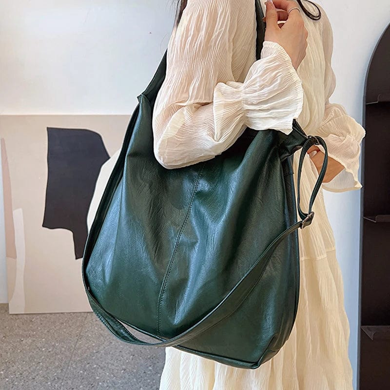Sac cabas élégant noir en cuir vegan, anse doublée, idéal pour femme moderne