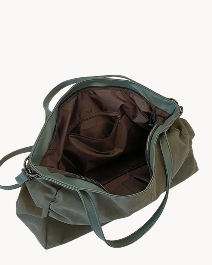 Sac cabas marron en cuir véritable pour femme, style chic et spacieux, parfait pour un usage quotidien.