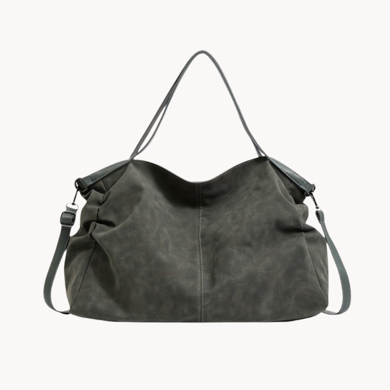 Sac cabas vert bouteille en cuir, modèle oversize avec bandoulière, élégant et très spacieux pour femme.