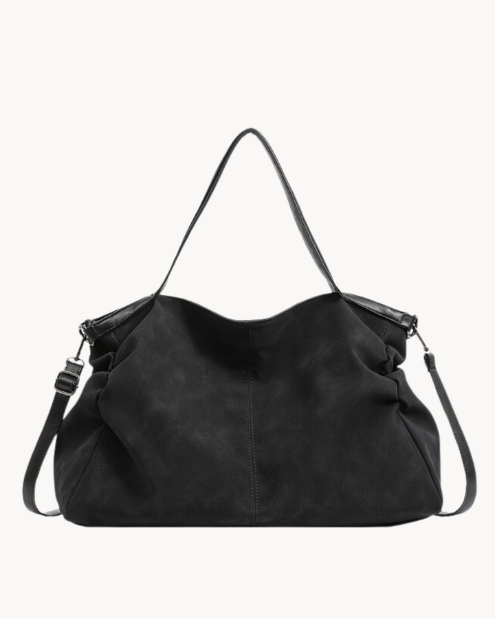 Grand sac cabas oversize en cuir, accessoire de mode élégant et pratique pour femme, disponible en plusieurs couleurs.