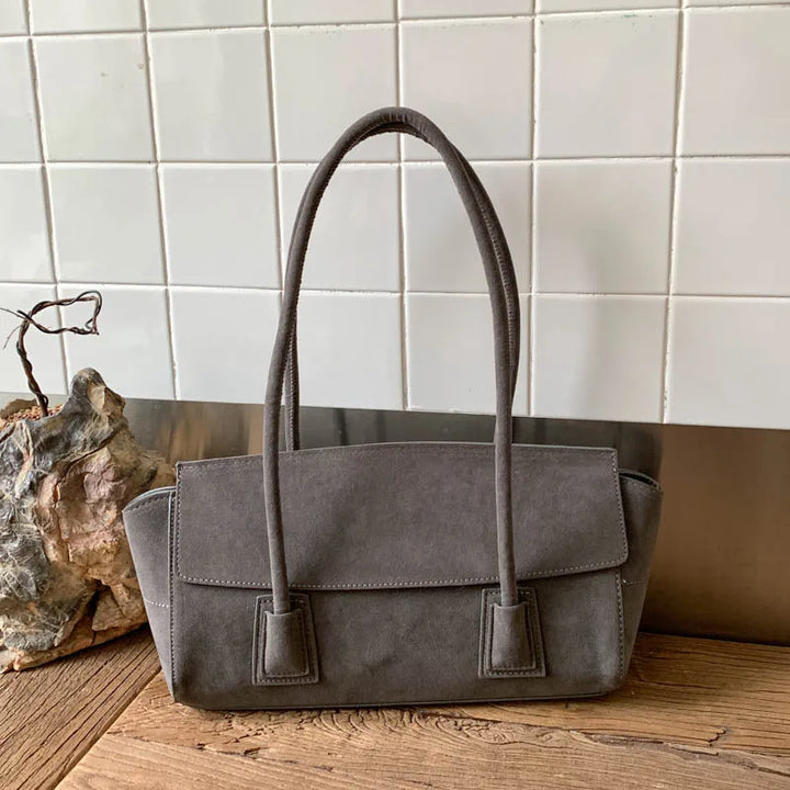 Sac cabas Zély chic noir en daim, accessoire féminin moderne, parfait pour une élégance quotidienne.