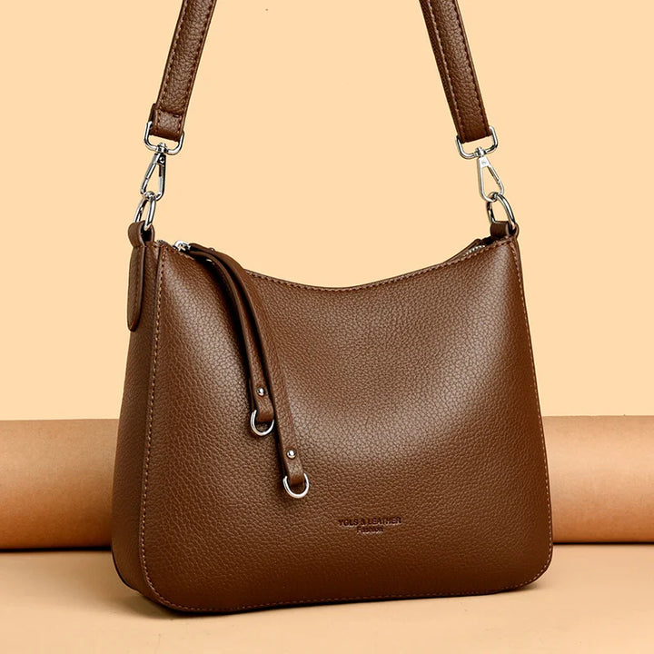Accessoire femme élégant: sac Carson bandoulière/épaule en similicuir, idéal pour le quotidien.