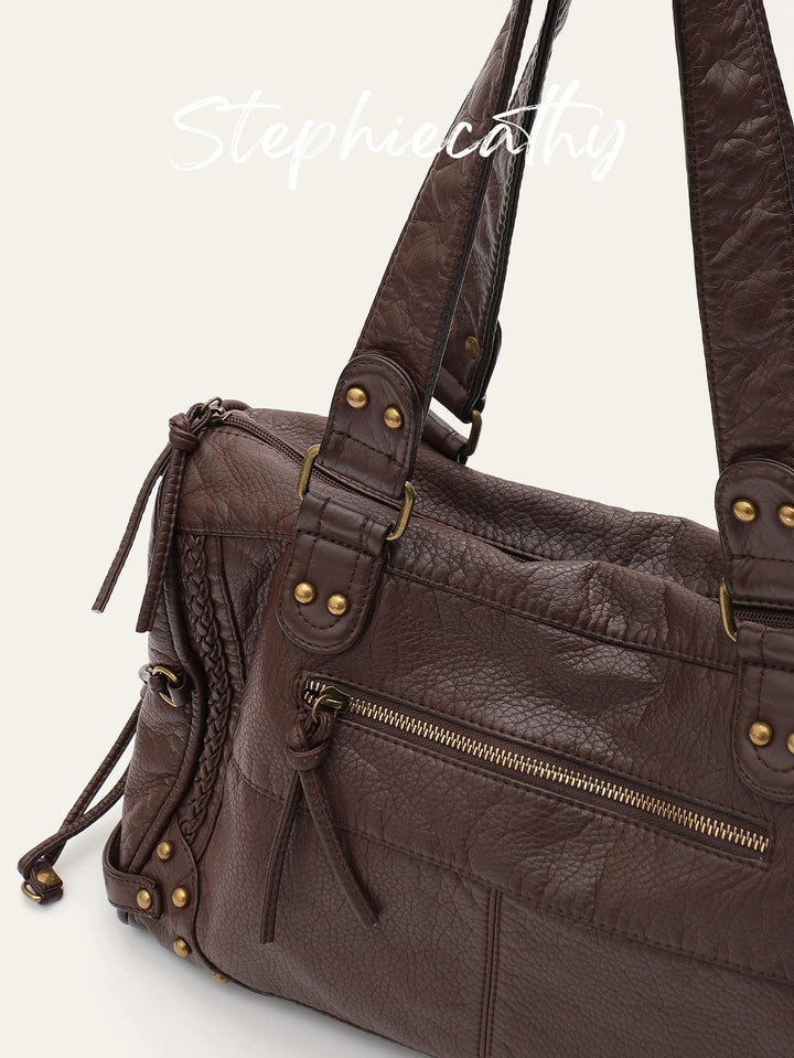 Accessoire femme : sac d'épaule vintage noir en simili cuir, parfait pour un look rétro et pratique