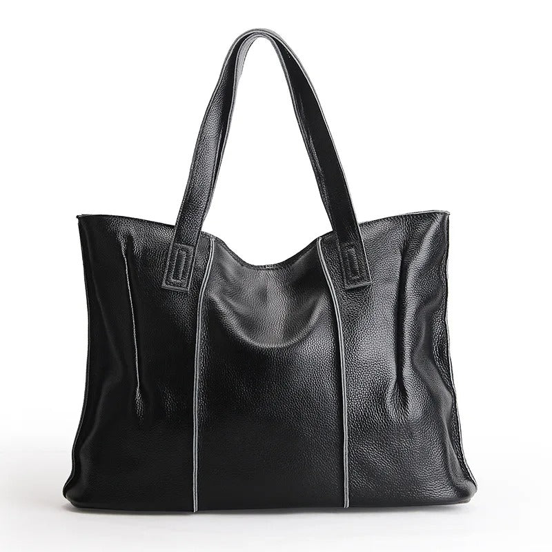 Sac de cours femme en cuir élégant, idéal pour étudiante ou travail. Style et organisation.