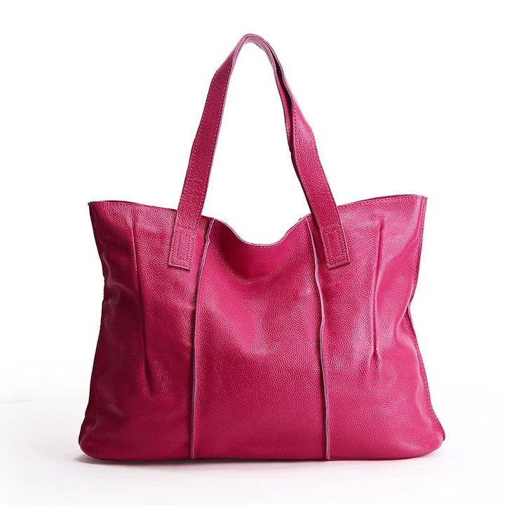 Sac à main femme en cuir, élégant et pratique pour les cours ou le bureau. Organisation optimale.