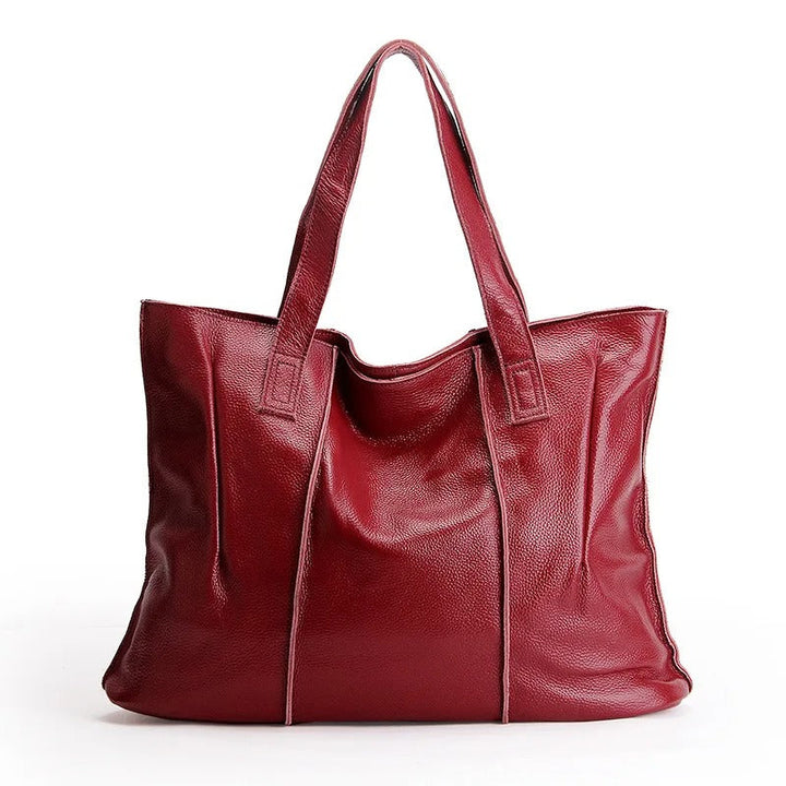 Grand sac cabas cuir femme, parfait pour étudiante ou professionnelle. Compartiments organisés.