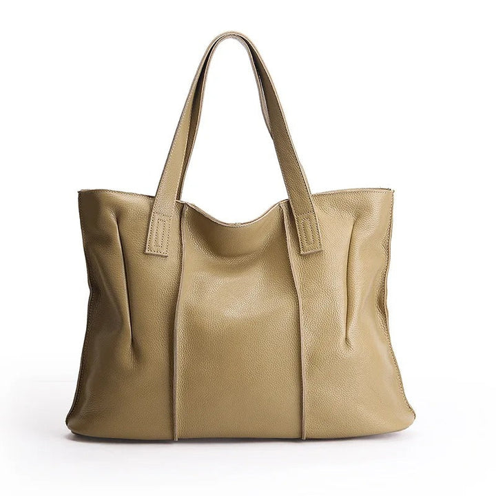 Sac de mode femme en cuir souple, polyvalent pour cours, travail ou usage quotidien. Chic et organisé.