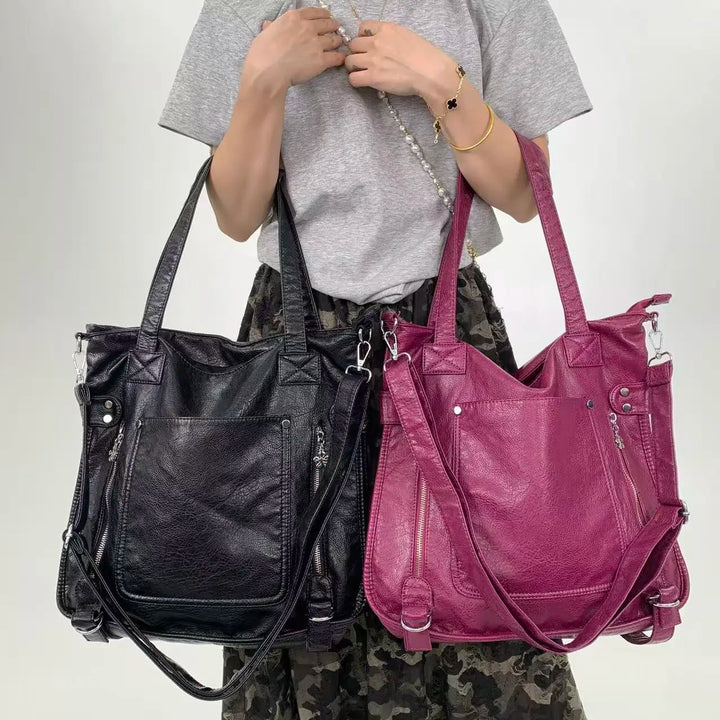 Sac épaule femme violine chic, grand compartiment, accessoire mode idéal pour les étudiantes.