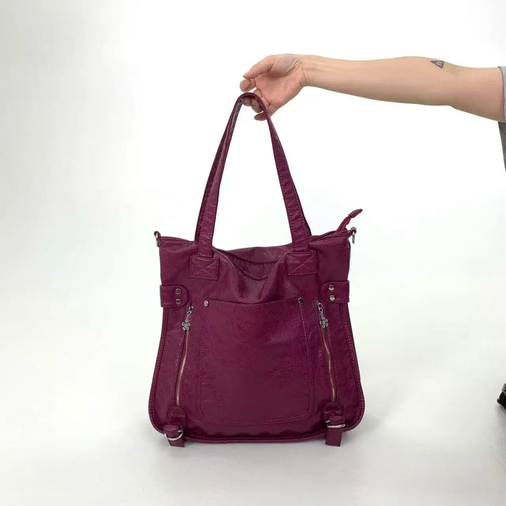 Sac scolaire femme noir polyvalent, parfait pour transporter cahiers et essentiels avec style.