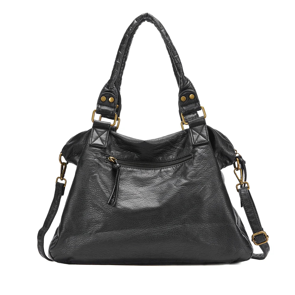 Sac de cours hobo rétro-chic, spacieux et confortable à porter.