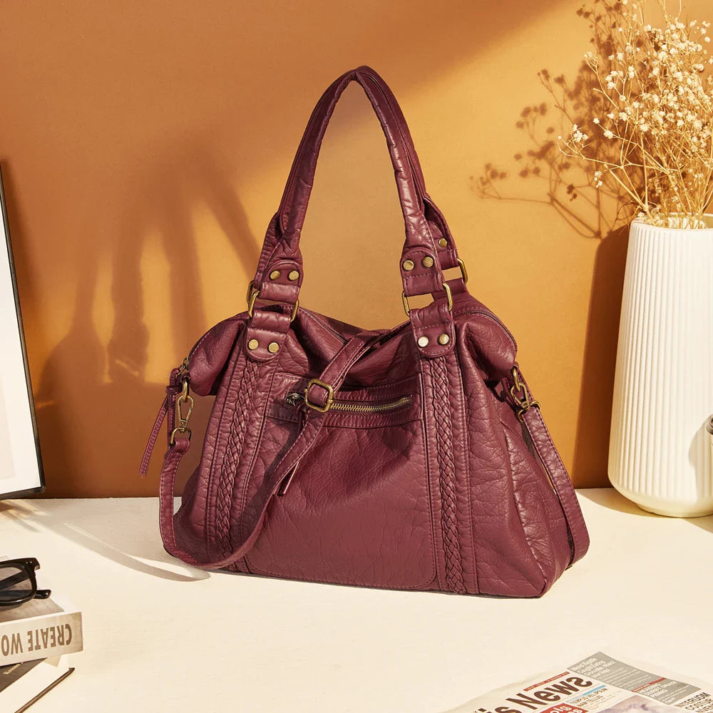 Sac épaule femme vintage, grand format, en cuir synthétique durable.