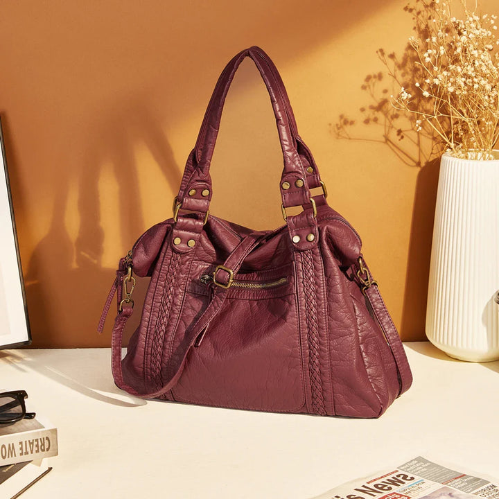 Sac épaule femme vintage, grand format, en cuir synthétique durable.