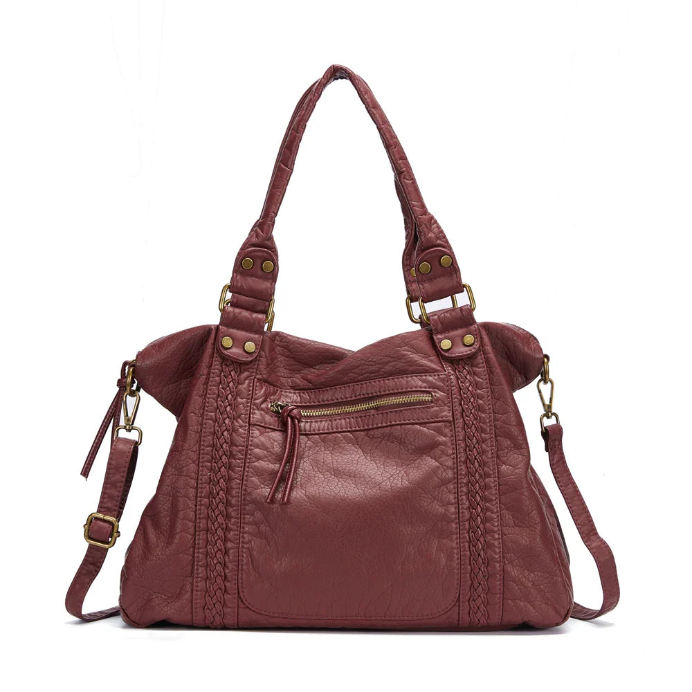 Sac de cours grand format en cuir synthétique, design vintage intemporel.