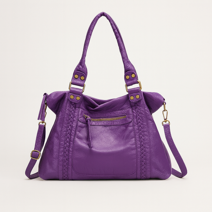Femme portant un grand sac de cours vintage hobo en bandoulière sur l'épaule, cuir synthétique marron.