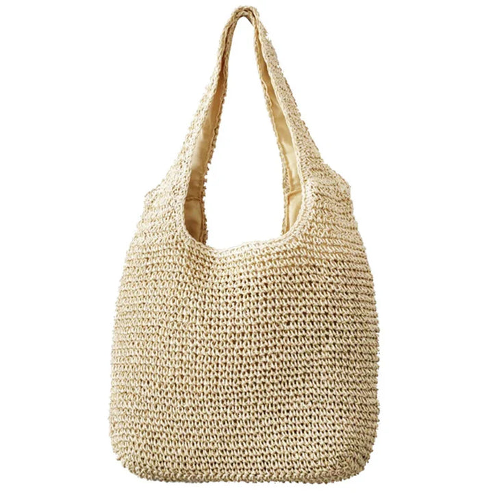 Grand sac de plage en paille tressée, cabas spacieux pour femme, essentiel de l'été chic.