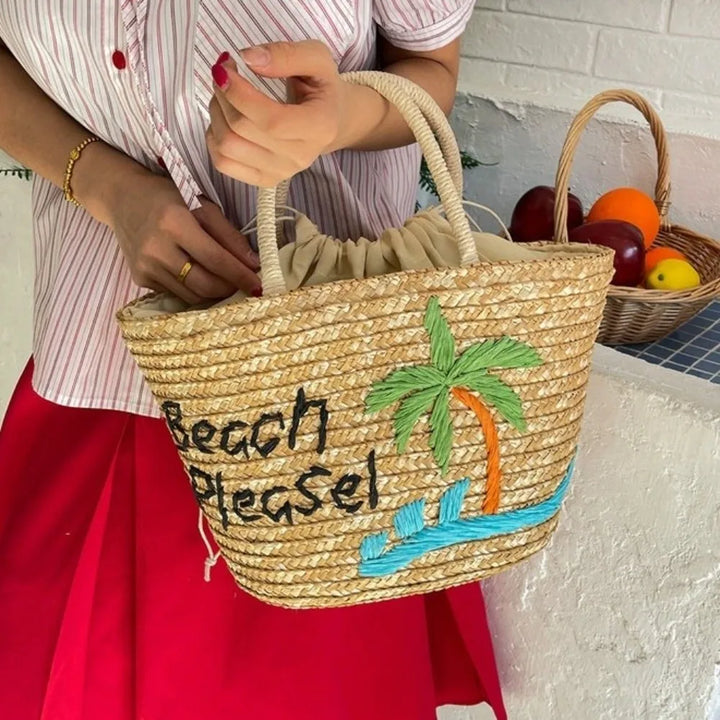 Sac de plage en paille brodé beige pour femmes, style estival et chic.