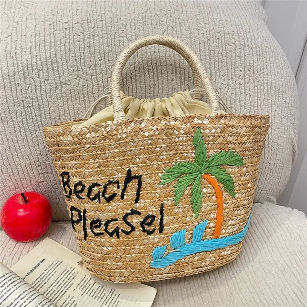 Grand sac de plage bohème en paille tressée, motif brodé unique, pour femme.