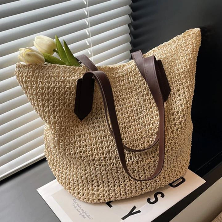 Sac cabas fourre-tout en paille pour femme, léger, chic et indispensable pour la plage ou les vacances d'été.