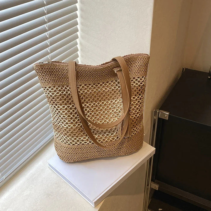Sac de plage en paille tressée pour femme, style bohème chic, idéal pour l'été et les vacances.