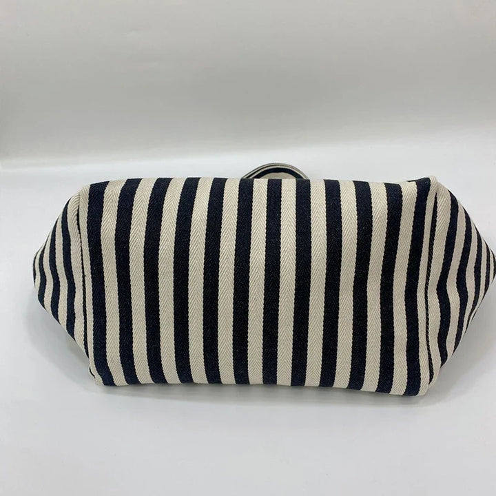 Sac de plage en toile canvas résistant pour l'été, grand et pratique pour toutes les sorties familiales.