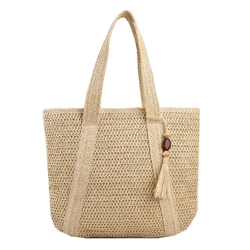 Sac de plage élégant en paille et coton, un indispensable pour vos vacances d'été à la plage.