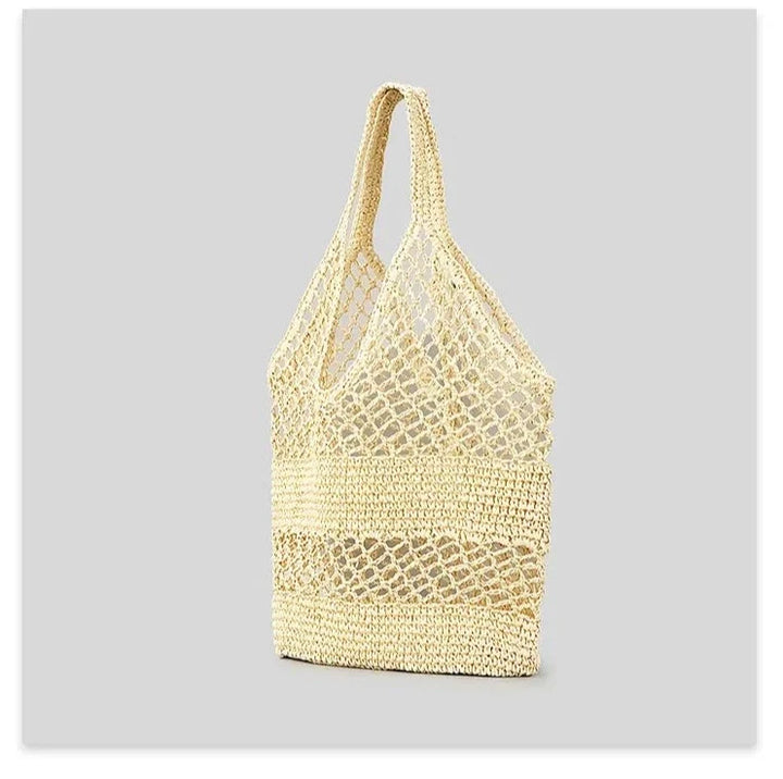 Sac filet de plage bohème pour femme en paille, grand et aéré, idéal pour les vacances d'été.