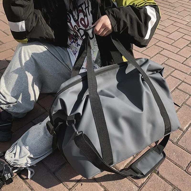 Sac de plage fourre-tout gris, imperméable et résistant pour voyage en famille et vacances d'été.
