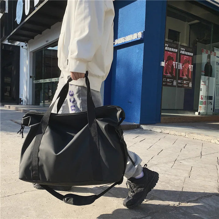 Sac de plage noir grande capacité pour femme, idéal pour l'organisation de voyage et vacances d'été.