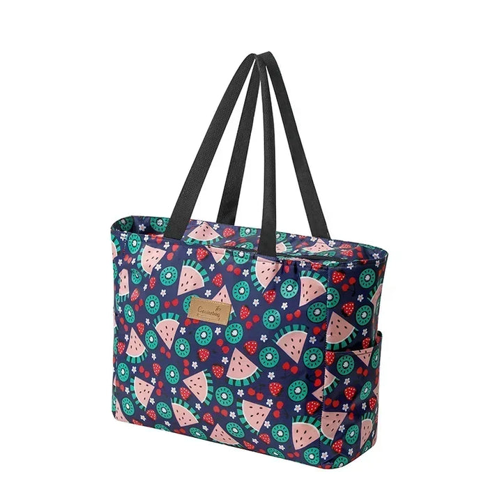 Sac femme déperlant avec compartiment isotherme, idéal pour la plage, les vacances et pique-niques d'été.