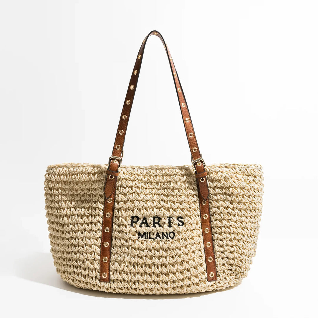 Sac de plage élégant en raphia tressé pour femme, style bohème chic, parfait pour l'été et les vacances.