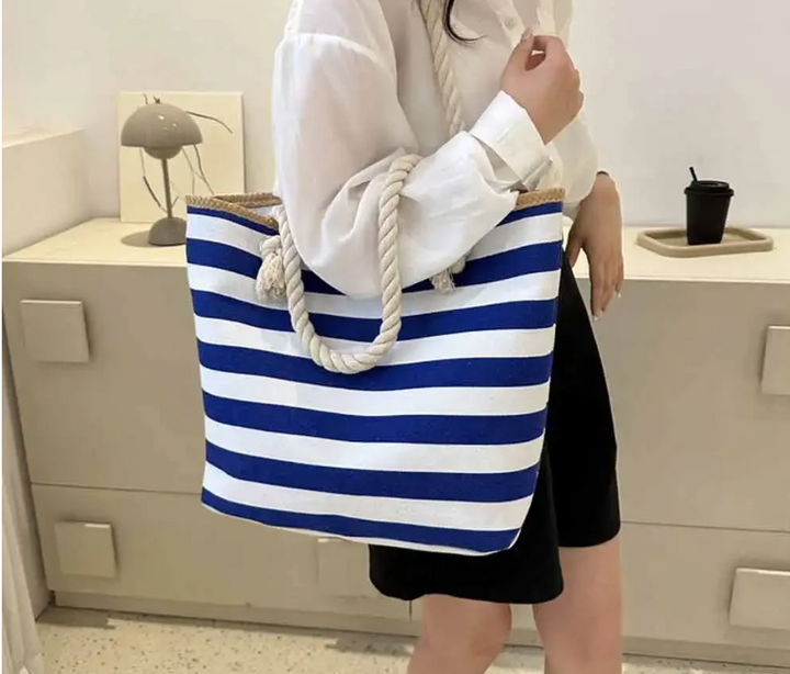 Grand sac cabas de plage en toile canvas style marin pour femme, idéal pour l'été, avec fermeture éclair sécurisée.