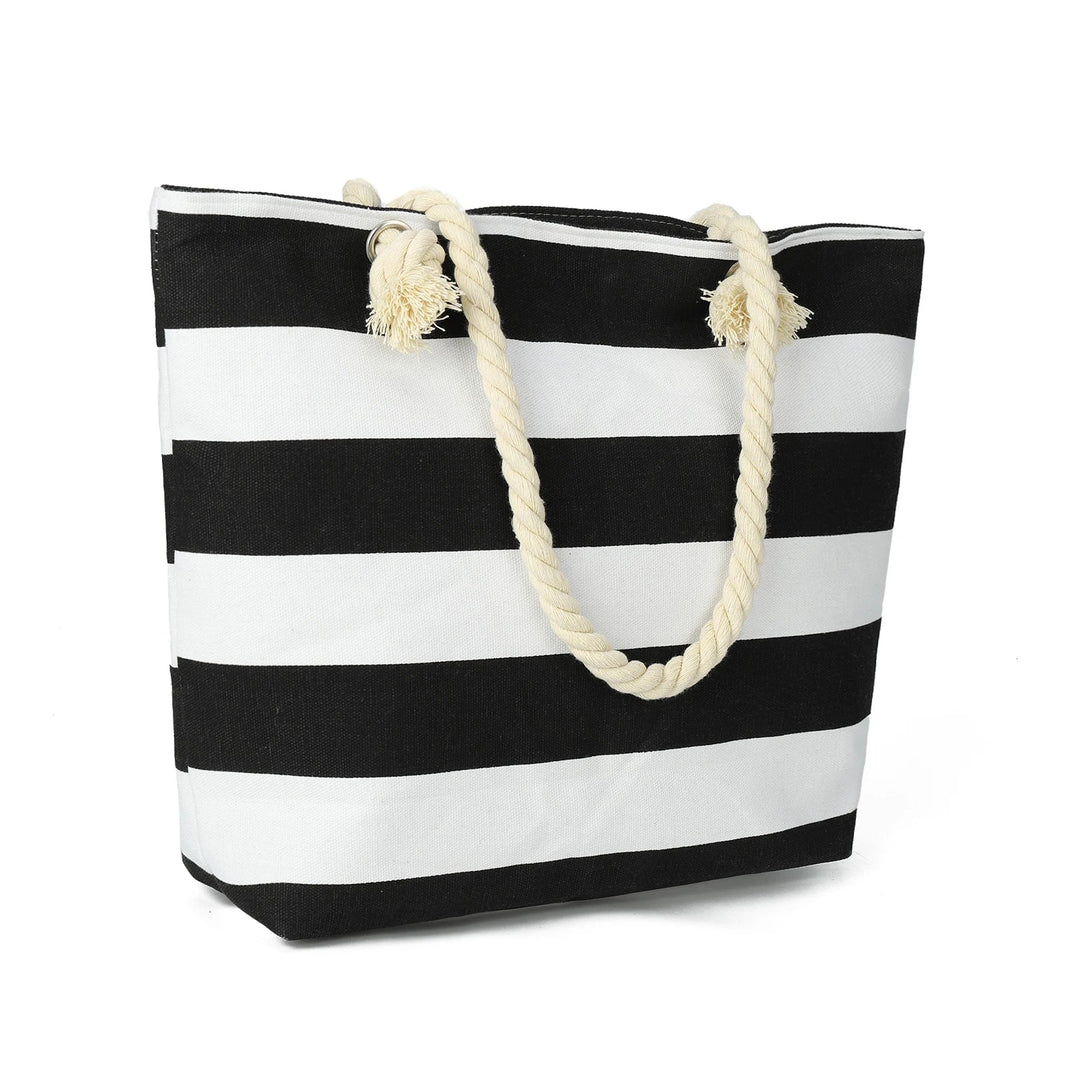 Sac de plage élégant en paille tressée, anses en cuir, accessoire femme chic