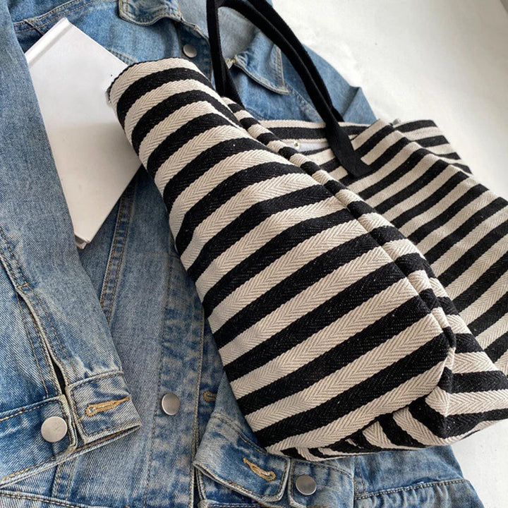 Élégant sac de plage marinière noir et blanc pour femme, grand format XL en toile, indispensable été.
