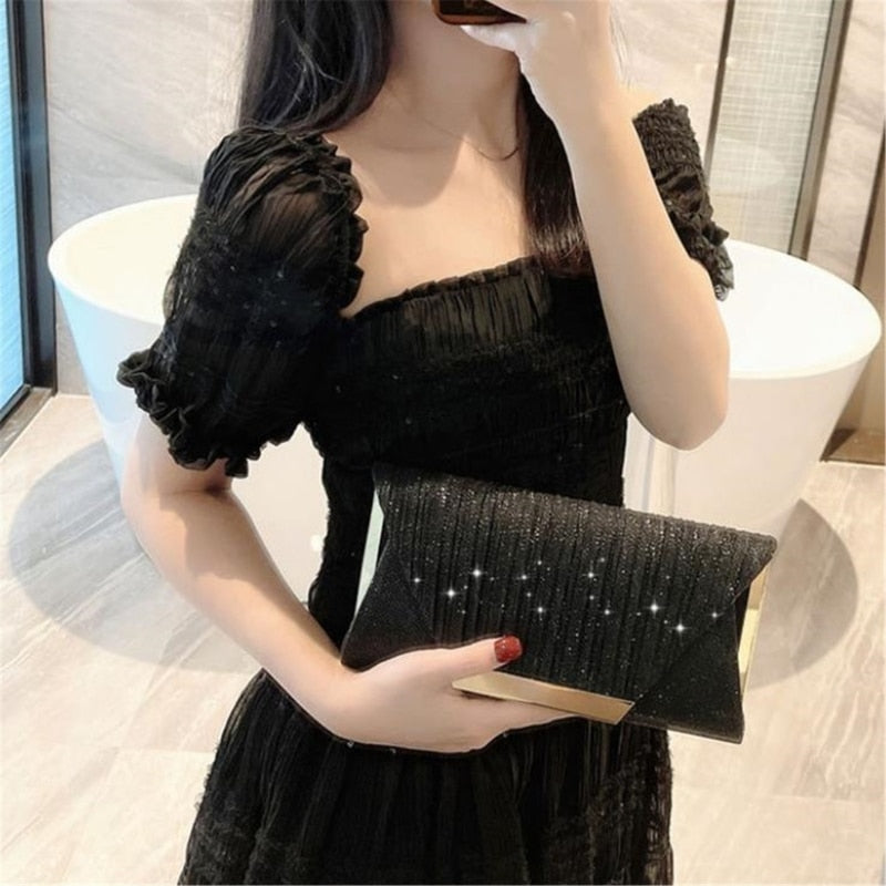Sac bandoulière femme noir à paillettes, parfait pour une soirée élégante ou un événement